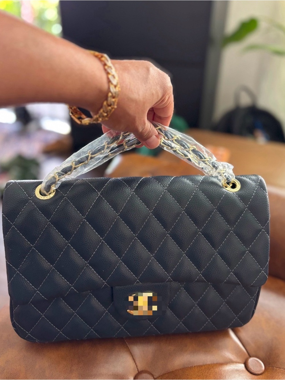 Quilted Black Leather Shoulder Bag with Gold Chain Handle